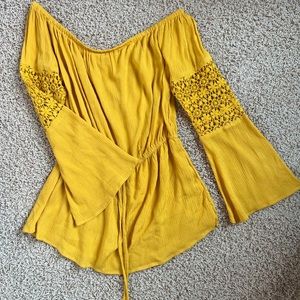 Off-the-shoulder shirt. Perfect for senior photos.